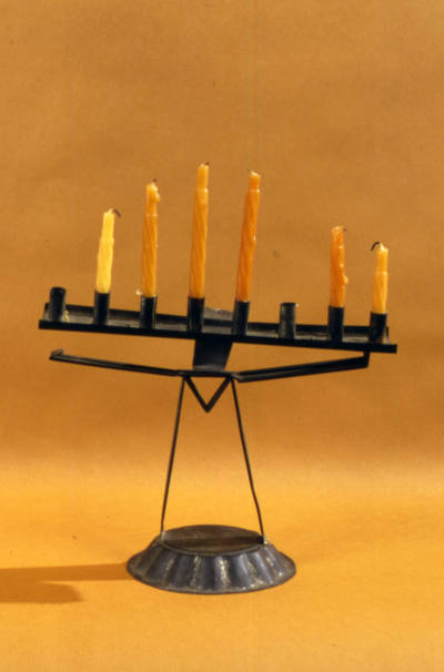 Artist unidentified, “Menorah",” Probably New York City, 19th century, Tin, with wax and string…