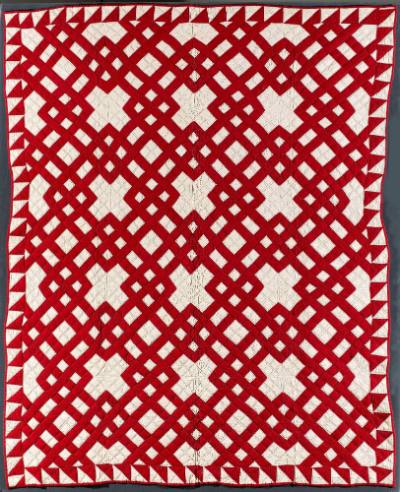 Unidentified women of the Walker household, “Red and White Lattice with Sawtooth Border Quilt,”…