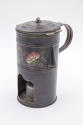 Artist unidentified, (1805-1900), “Pap warmer,” United States, Late 19th Century, Paint on tin,…