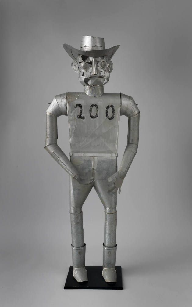 Rene LaTour, (b. 1905), “Tin Cowboy,” Ormond Beach, Florida, c. 1983, Tin, 72 × 29 × 20 in., Co…