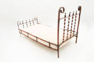 Artist unidentified, “Doll Bed”, United States, n.d., Metal with cotton mattress, 10 1/2 × 8 3/…