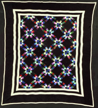 Esther Enger, “Double Wedding Ring Quilt”, Holmes Count, Ohio, n.d., Cotton and sateen, wool, s…