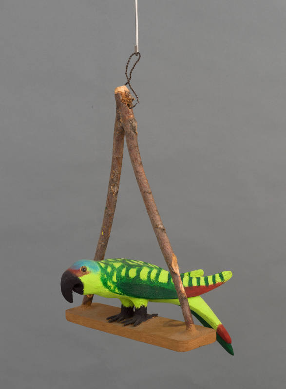 Rod Rodgiquez, “Parrot on a swing”, New Mexico, n.d., Wood, glass eyes, metal, tree branches, 2…