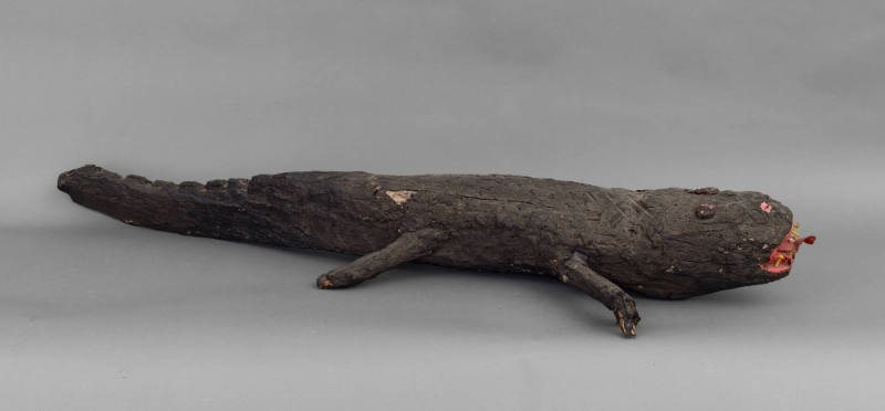  Sam Doyle, “Alligator”, Georgia, n.d., Tar on wood, oil paint, nails and metal, 7 × 55 3/4 × 1…