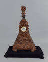 Joseph Yoges, “Tramp Art Clock”, Detroit, Michigan, 1930s, Carved wood, clock with circular med…