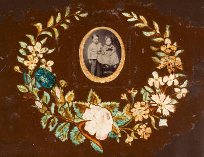 Wreath of Flowers with Daguerreotype of Boy and Girl
Artist unidentified
United States
c. 18…