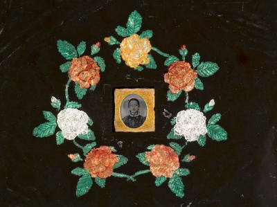 Wreath of Flowers with Daguerreotype of Young Girl
Artist unidentified
United States
c. 1864…