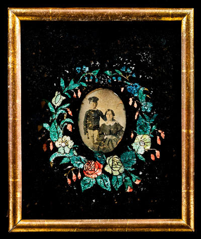 Wreath of Flowers with Photograph of Mother and Son
Artist unidentified
United States
c. 186…