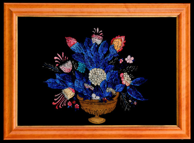 Urn of Flowers with Blue Leaves
Artist unidentified
United States
c. 1880–1890
Reverse pain…