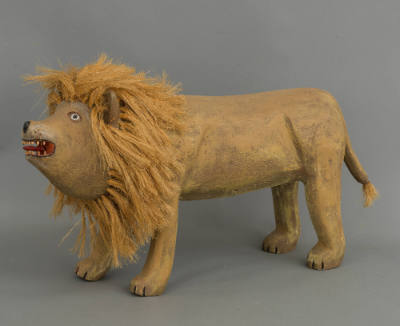 David Alvarez, “Lion”, Santa Fe, New Mexico, 1982, Paint on cottonwood, sisal, 13 3/8 × 7 1/2 ×…