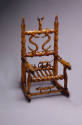 Michael Rothloff, (1855–1930), “Rocking Chair,” Athens, Pennsylvania, 1922, Carved fruitwood, 1…