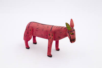 Artist unidentified, (1805-1900), “Pink Burro,” Oaxaca, Mexico, c. 1980, Wood, 2 x 8 x 4 1/2 in…