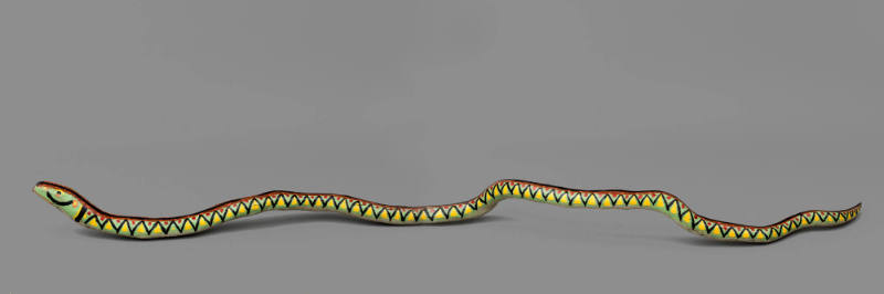 Miles Carpenter, “Snake”, Waverly, Virginia, 1974, Paint on wood, twist-tie tongue, 9 × 121 × 1…