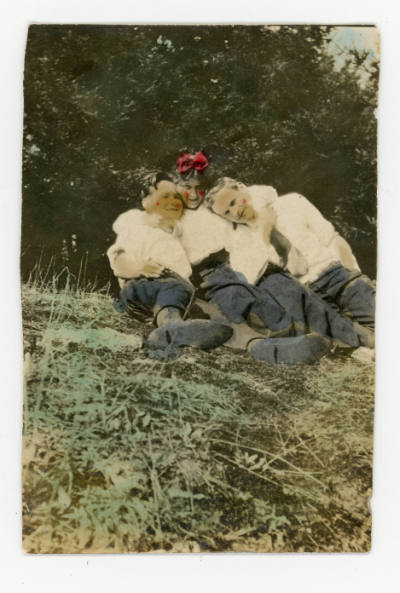 Artist unidentified, “Untitled [Group portrait of three people seated on grass]”, United States…