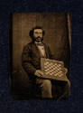 Artist unidentified, “Untitled [Man with a gameboard]”, United States, 1863–1865, Tintype, 4 3/…