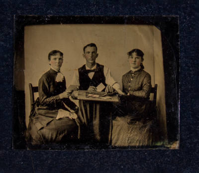 Artist unidentified, “Untitled [Three people with a gameboard]”, United States, 1872–1875, Tint…