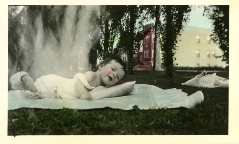 Photographer unidentified, “Untitled [Baby laying on a pillow and blanket]”, United States, Ear…